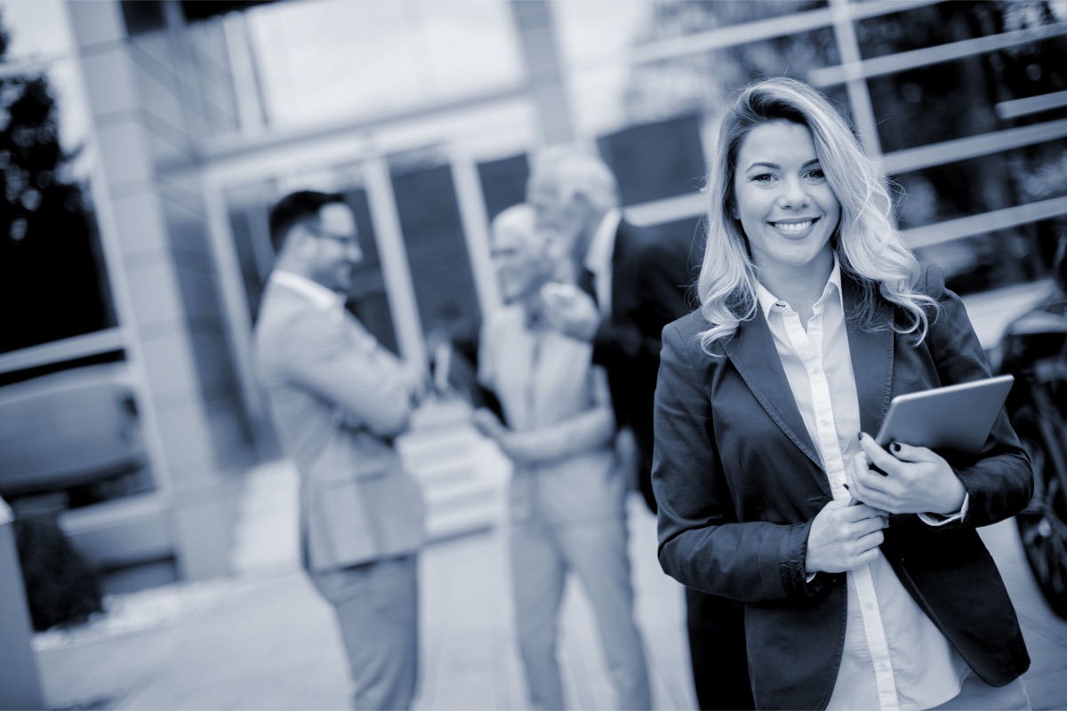 A Derby Sales representative outside a client's offices in Dubai
